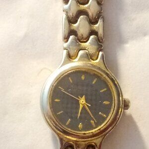 Vintage Stainless Steelback.Geneva snap on wrist-Watch metal.Yellow/gold & Navy.